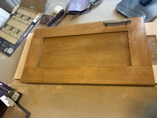 Cabinet stripping & restaining — before