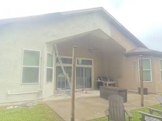 Exterior & covered patio painting — during