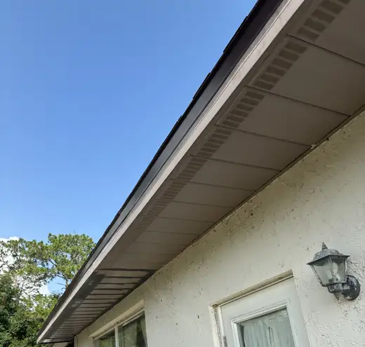 Gutter & exterior trim painting — during